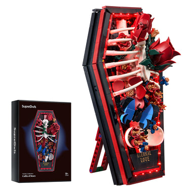 SupreOwls Coffin of Roses building block set with red roses, skeleton ribs, blue butterflies and glowing red LED lights, shown beside the product box.