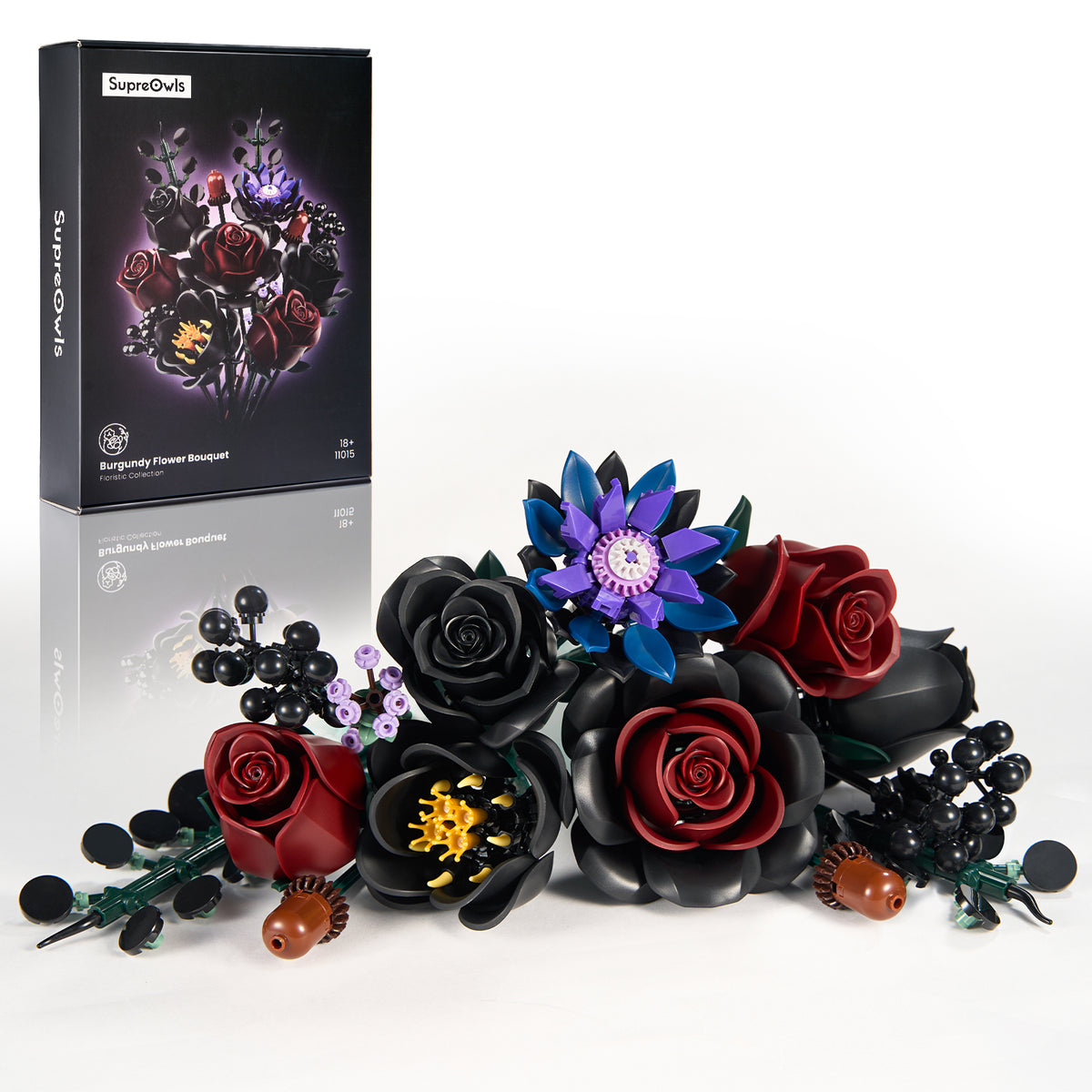 Gothic flower bouquet building set arranged with individual black, red, and purple flower pieces displayed alongside product packaging on a white background.