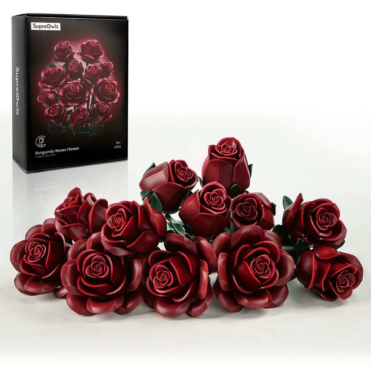 Burgundy rose building bouquet set displayed with multiple deep red rose blooms and product packaging on a white background, showcasing the rich layered petals and elegant floral design.