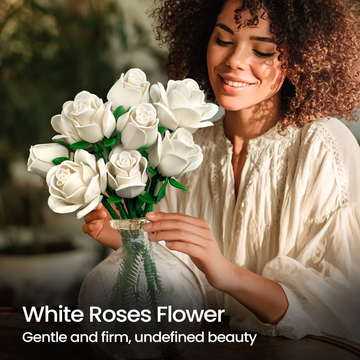 Woman holding a white roses bouquet building block set in a bright home setting, showcasing the elegant floral arrangement as a decorative piece.