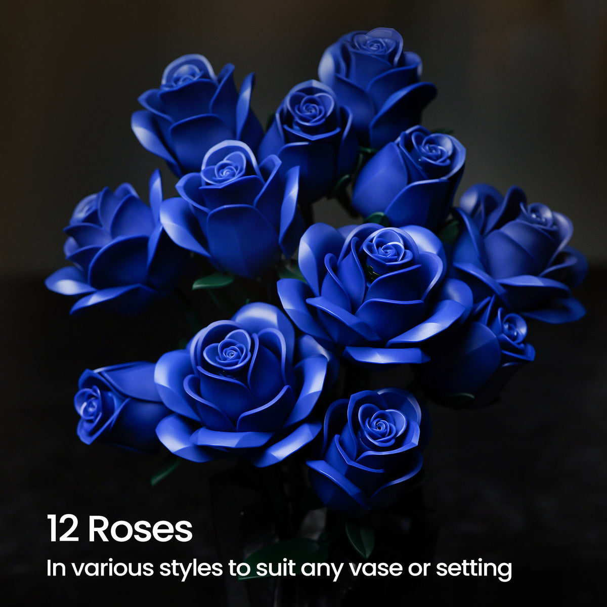 A bouquet of 12 deep blue roses with layered petals arranged in different styles, displayed against a dark background to showcase the elegant floral design and versatile vase arrangement.