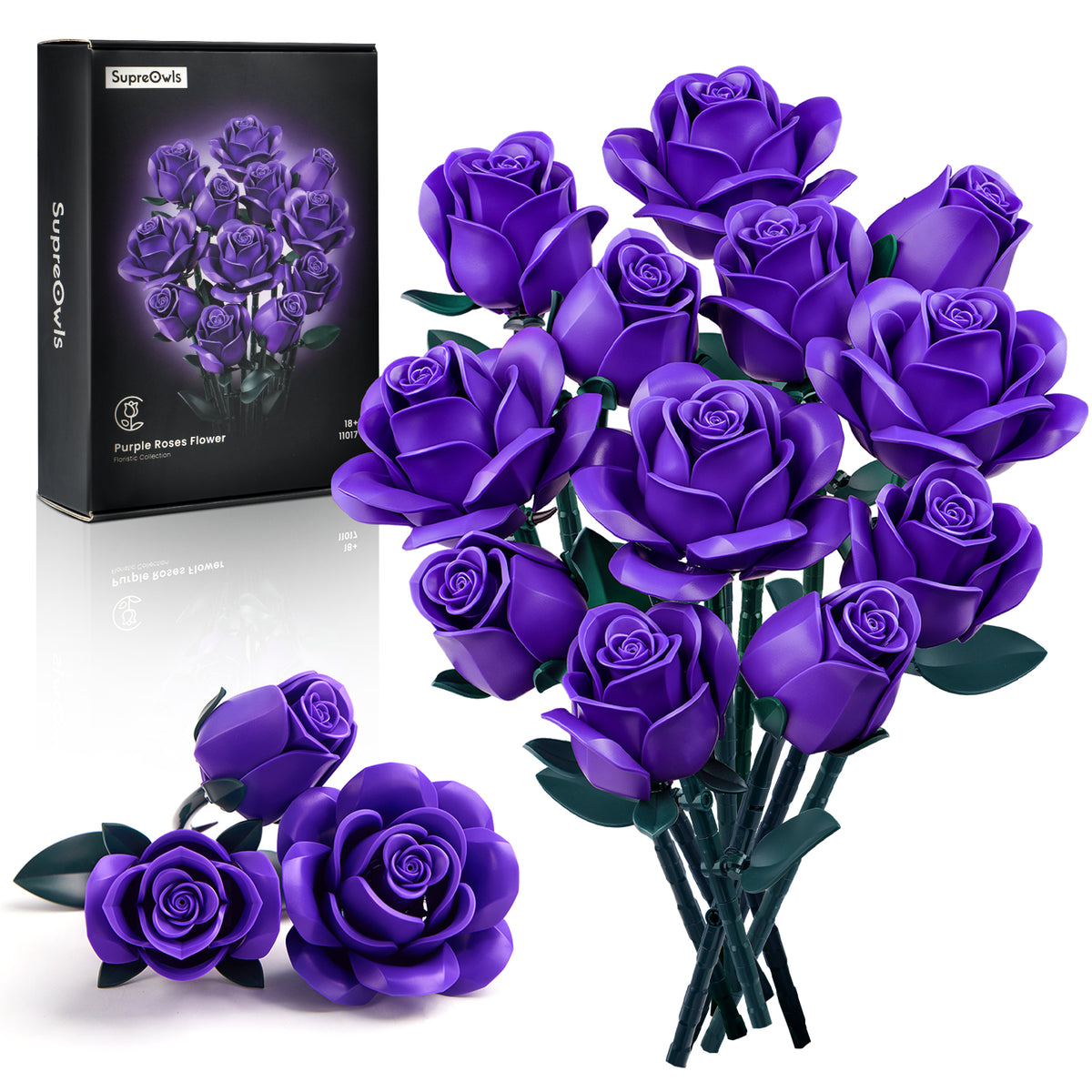 Purple roses bouquet building block set with assembled flowers and product packaging showcasing a decorative floral building kit.