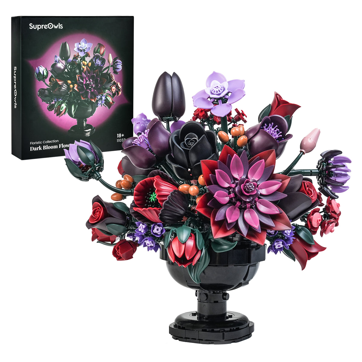 Gothic flower building block bouquet with layered black, deep red, purple and lavender blooms arranged on a decorative black base.