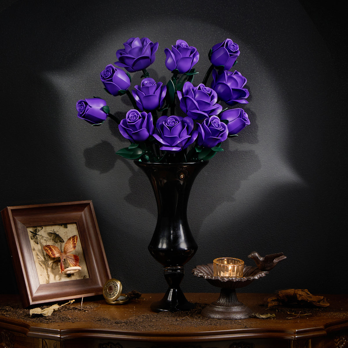 Purple rose bouquet building block set displayed in a black vase with realistic brick-built flowers, creating a dark elegant home decor centerpiece.