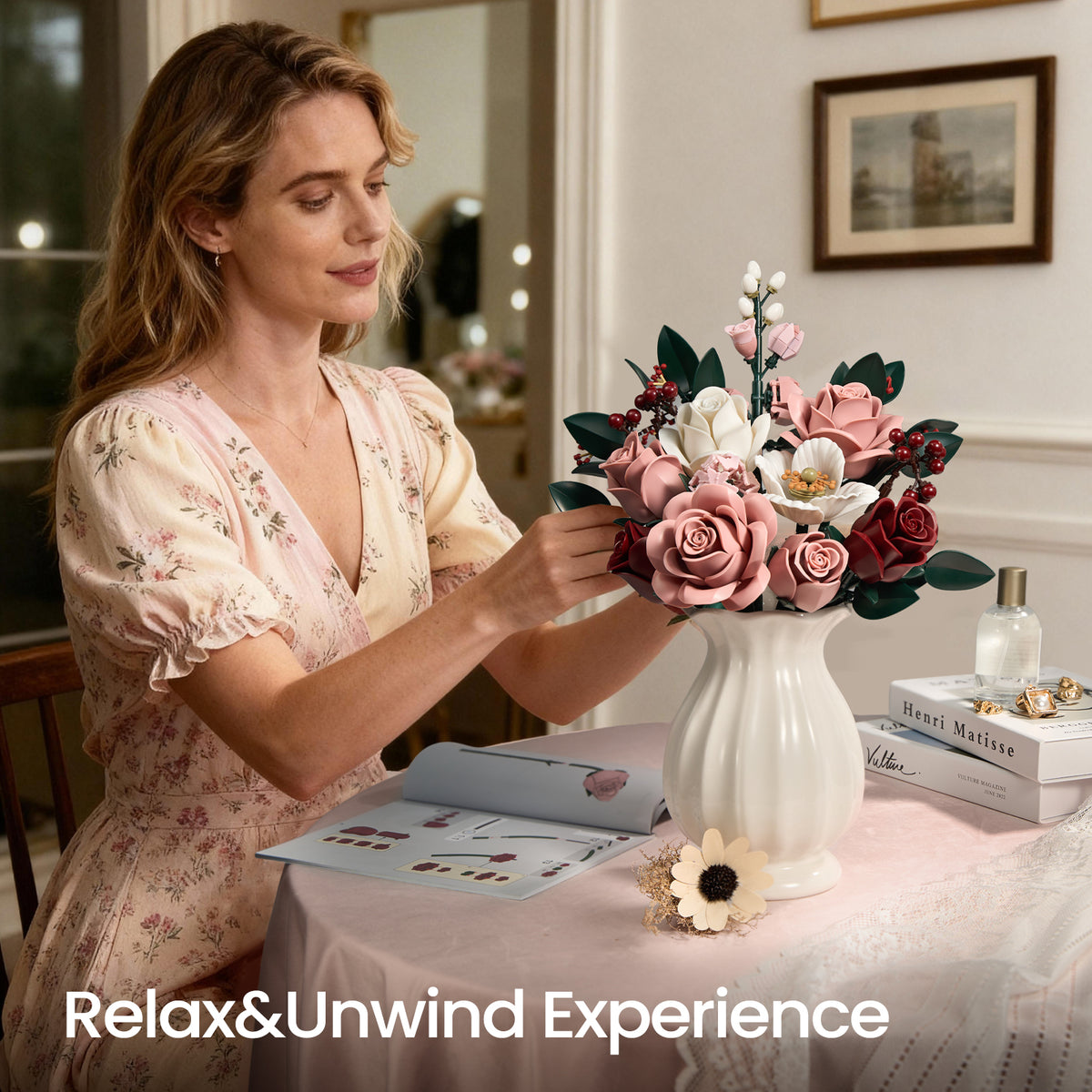 Person assembling a pink rose bouquet building block set at a table, showing the creative DIY flower building experience in a warm home environment.