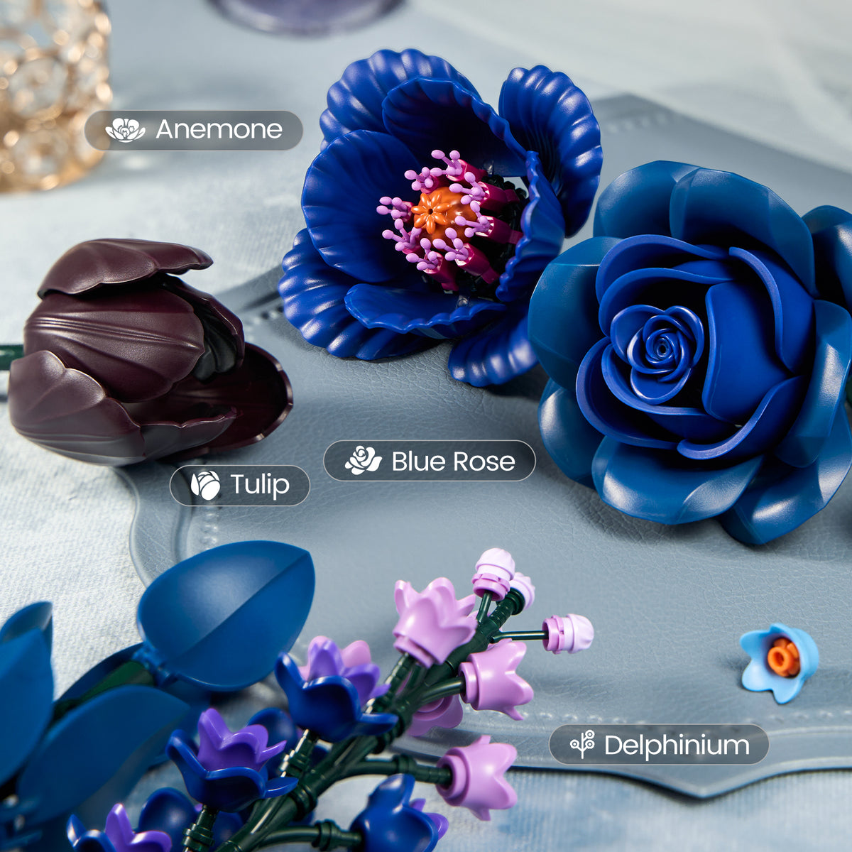 Blue Flower Bouquet building block set featuring a blue rose, blue anemone, dark tulip and purple delphinium flowers in a close-up display